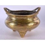A 19TH CENTURY CHINESE TWIN HANDLED BRONZE CENSER bearing Xuande marks to base. 13 cm wide, internal