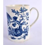 AN 18TH CENTURY CAUGHLEY PARROT PECKING FRUIT MUG. 11 cm high.