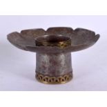 AN 18TH/19TH CENTURY TIBETAN INLAID WHITE METAL TEABOWL STAND decorated with motifs. 67 grams. 10 cm