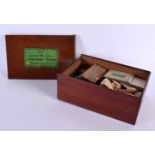 A VICTORIAN BOXED SET OF CONJURING MAGIC TRICKS. Box 23 cm x 14 cm.