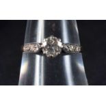 A LOVELY 18CT GOLD AND DIAMOND SOLITAIRE RING. 1.9 grams.