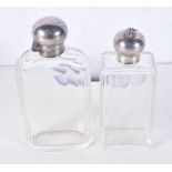 TWO SILVER TOPPED HIP FLASKS. Largest 18 cm x 8.5 cm. (2)