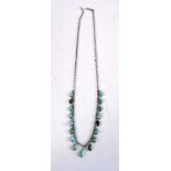 A SILVER AND TURQUOISE NECKLACE. 8.4 grams. 48 cm long.
