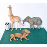 A collection of antique "Crelos Margarine" J Sainsbury advertising pieces in the form of animals