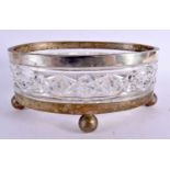 A LARGE EARLY 20TH CENTURY CONTINENTAL SILVER MOUNTED GLASS BOWL upon ball feet. 27 cm x 13 cm.