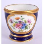 Sevres rare egg cup with cobalt blue ground painted with flowers in gilt panels Y mark for