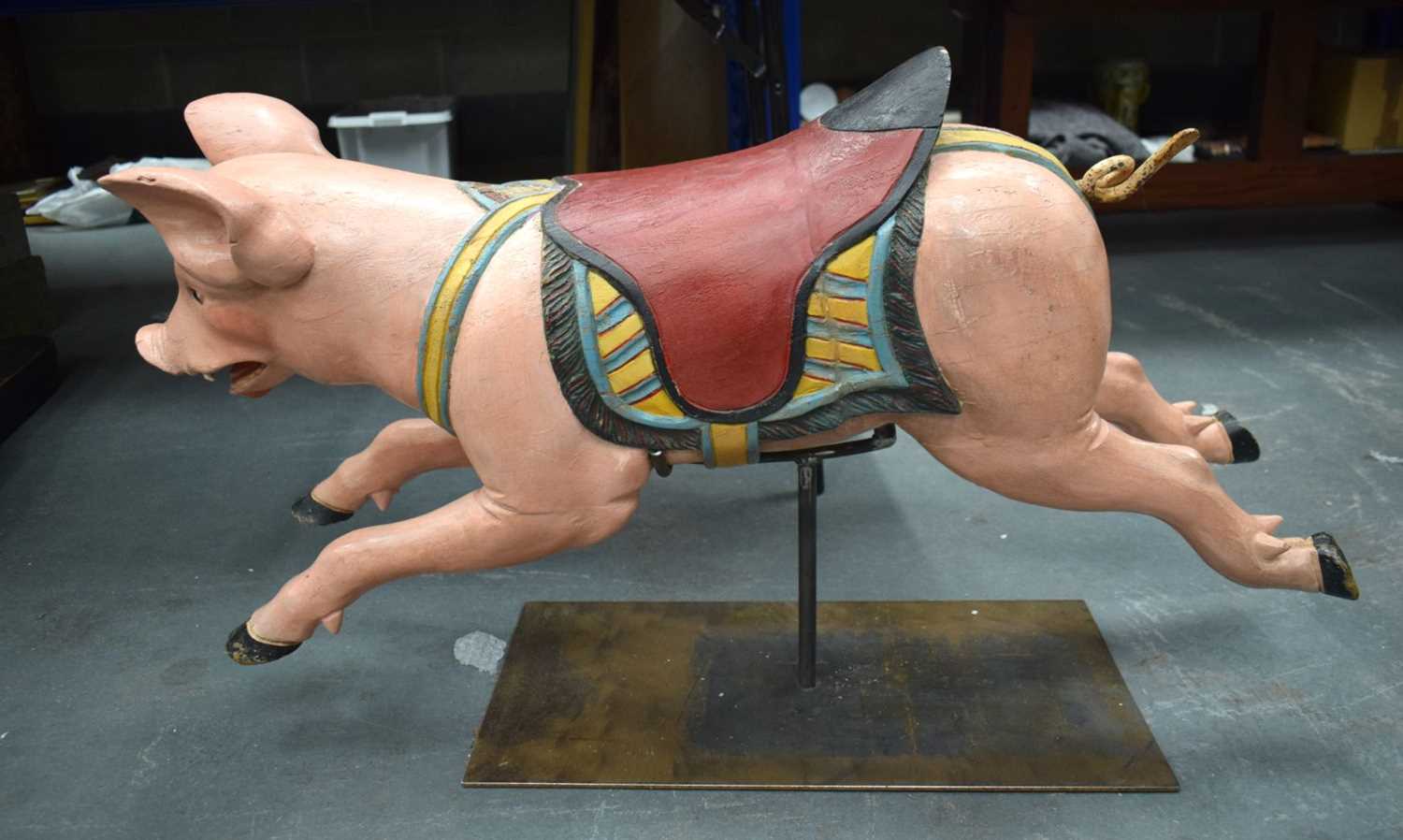 A CHARMING EARLY 20TH CENTURY CARVED AND PAINTED CAROUSEL PIG Attributed to Gustave Bayol. 85 cm x