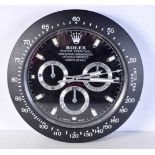 A Contemporary Rolex dealership style wall clock 34 cm.