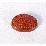 An Islamic agate carved tablet. 3 cm.