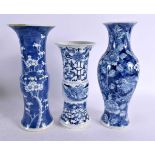 THREE 19TH CENTURY CHINESE BLUE AND WHITE PORCELAIN VASES Kangxi style. Largest 25 cm high. (3)