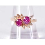 A 14CT GOLD RUBY AND DIAMOND RING. 3.7 grams. P.