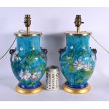 A PAIR OF 19TH CENTURY FRENCH POTTERY LAMPS Attributed to Theodore Deck. 37 cm x 15 cm.