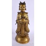 A 17TH CENTURY CHINESE GILT BRONZE FIGURE OF AN IMMORTAL Ming/Qing. 24 cm high.