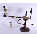 AN UNUSUAL 19TH CENTURY FRENCH J L & CIE CAST IRON SPINNING GLOBE INSTRUMENT upon a stepped base. 52
