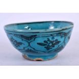 AN ANTIQUE PERSIAN TURQUOISE GLAZED BOWL. 12 cm diameter.