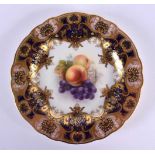 Royal Worcester plate painted with fruit, peaches and grapes, under a cobalt blue and highly gilt