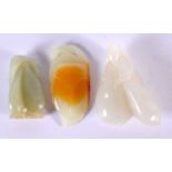 THREE CHINESE CARVED JADE FRUITING PODS 20th Century. Largest 6 cm x 4.5 cm. (3)