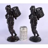 A PAIR OF 19TH CENTURY JAPANESE MEIJI PERIOD BRONZE OKIMONO modelled as roaming geisha holding