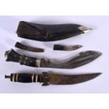 TWO NEPALESE HORN HANDLED GURKHA KNIVES. 22 cm long. (2)