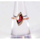 AN ANTIQUE YELLOW METAL AND RUBY RING possibly Russian. J. 1.9 grams.