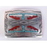 A SOUTH AMERICAN SILVER AND TURQUOISE TRIBAL BUCKLE. 35 grams. 5 cm x 7 cm.