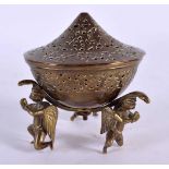A 19TH CENTURY MIDDLE EASTERN BRASS INCENSE BURNER AND COVER formed with seated deity. 9 cm x 9 cm.