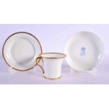 A SEVRES PORCELAIN CUP AND SAUCER together with a similar saucer. 11.5 cm wide. (3)