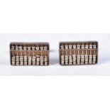A PAIR OF CHINESE SILVER ABACUS CUFFLINKS. 9.8 grams. 2.25 cm x 1.25 cm.