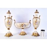 A Sevres style porcelain set two lidded vases and a centrepiece bowl largest 46 cm (3).