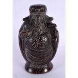 A CHINESE CARVED BUFFALO HORN TYPE FIGURE OF A SCHOLAR 20th Century. 661 grams. 15 cm x 8 cm.