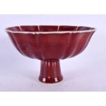 A CHINESE SANG DU BOEUF STEM FOOT BOWL 20th Century. 15 cm wide.