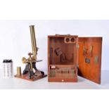 A wooden cased Broadhurst microscope 27 x 19 cm.