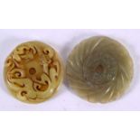 TWO CHINESE CARVED JADE ROUNDELS 20th Century. 5 cm wide. (2)