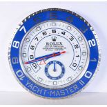 A Contemporary Rolex dealership style wall clock 34 cm.