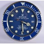 A Contemporary Rolex dealership style wall clock 34 cm.