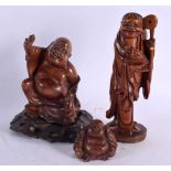 THREE 19TH CENTURY CHINESE CARVED HARDWOOD FIGURES Qing. Largest 18 cm high. (3)