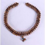 A LONG CHINESE TIBETAN ZHU BEAD BONE NECKLACE 20th Century. 486 grams. 56 cm long.