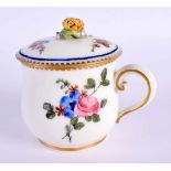 Sevres custard cup and cover with delicate flower finial painted with six floral sprays,