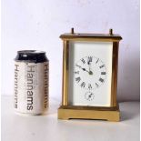 A French brass mantle clock 15 x 11 cm.