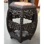 A 19TH CENTURY CHINESE CARVED HARDWOOD MARBLE INSET TABLE Qing, decorated all with foliage. 53 cm