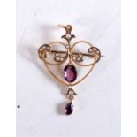 A 9CT GOLD AND AMETHYST BROOCH. 3 grams. 4.25 cm x 2.5 cm.