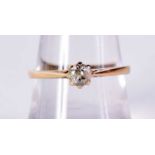 AN 18CT GOLD AND DIAMOND RING. 2.5 grams. P.