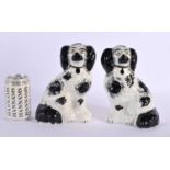 A PAIR OF 19TH CENTURY STAFFORDSHIRE FIGURES OF SPANIELS. 21 cm x 12 cm.