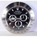 A Contemporary Rolex dealership style wall clock 34 cm.