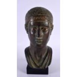A GRAND TOUR TYPE BRONZED BUST OF THE CHARIOTEER OF DELHI After the Antiquity. 23 cm high.