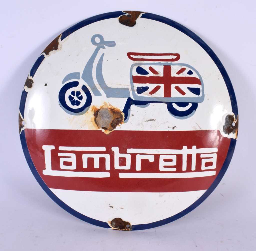 A CONTEMPORARY LAMBRETTA ADVERTISING SIGN. 30 cm diameter.