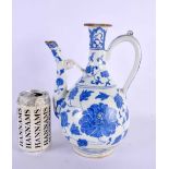 A LARGE TURKISH BLUE AND WHITE OTTOMAN IZNIK JUG painted with flowers. 27 cm x 15 cm.