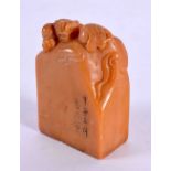 AN EARLY 20TH CENTURY CHINESE CARVED ORANGE SOAPSTONE SEAL Late Qing/Republic. 4.25 cm x 2.75 cm.