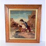 A large framed woven textile depicting a couple fishing. 41 x 36cm.