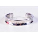 A TIFFANY & CO SILVER BANGLE. 40 grams. 5.5 cm x 4.25 cm.